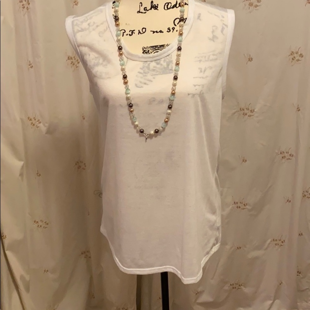 Sleeveless white top